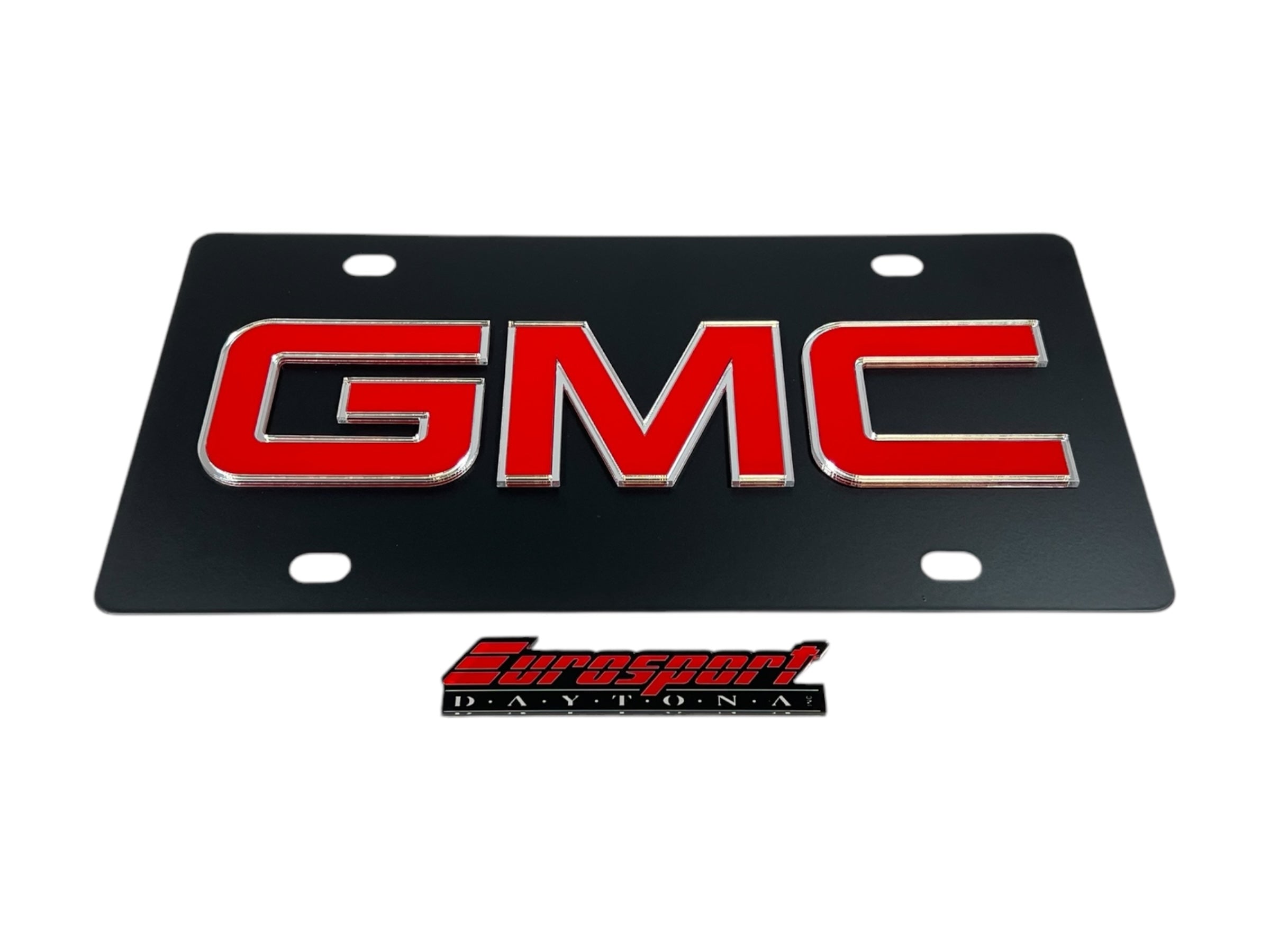 the gmc logo on a black background