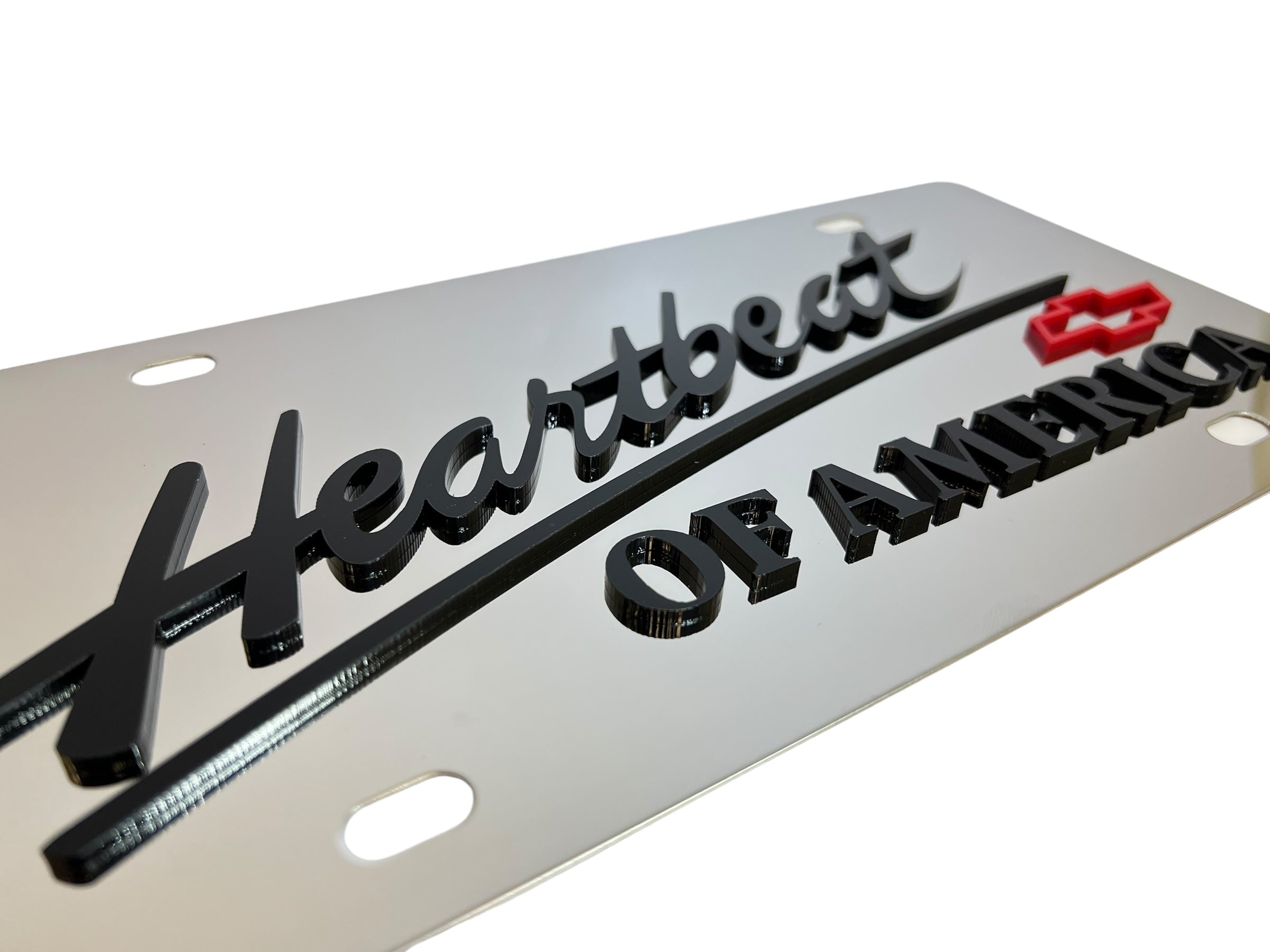 a metal license plate with the words heartbeats on it