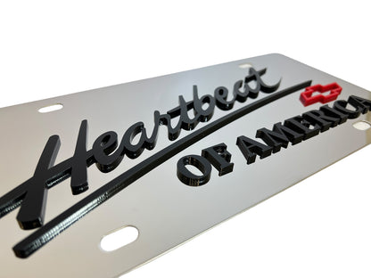 a metal license plate with the words heartbeats on it