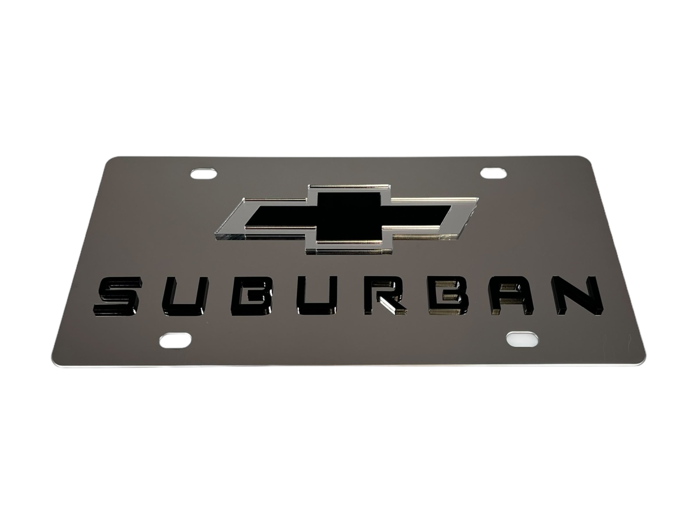 a metal license plate with the word suburban on it