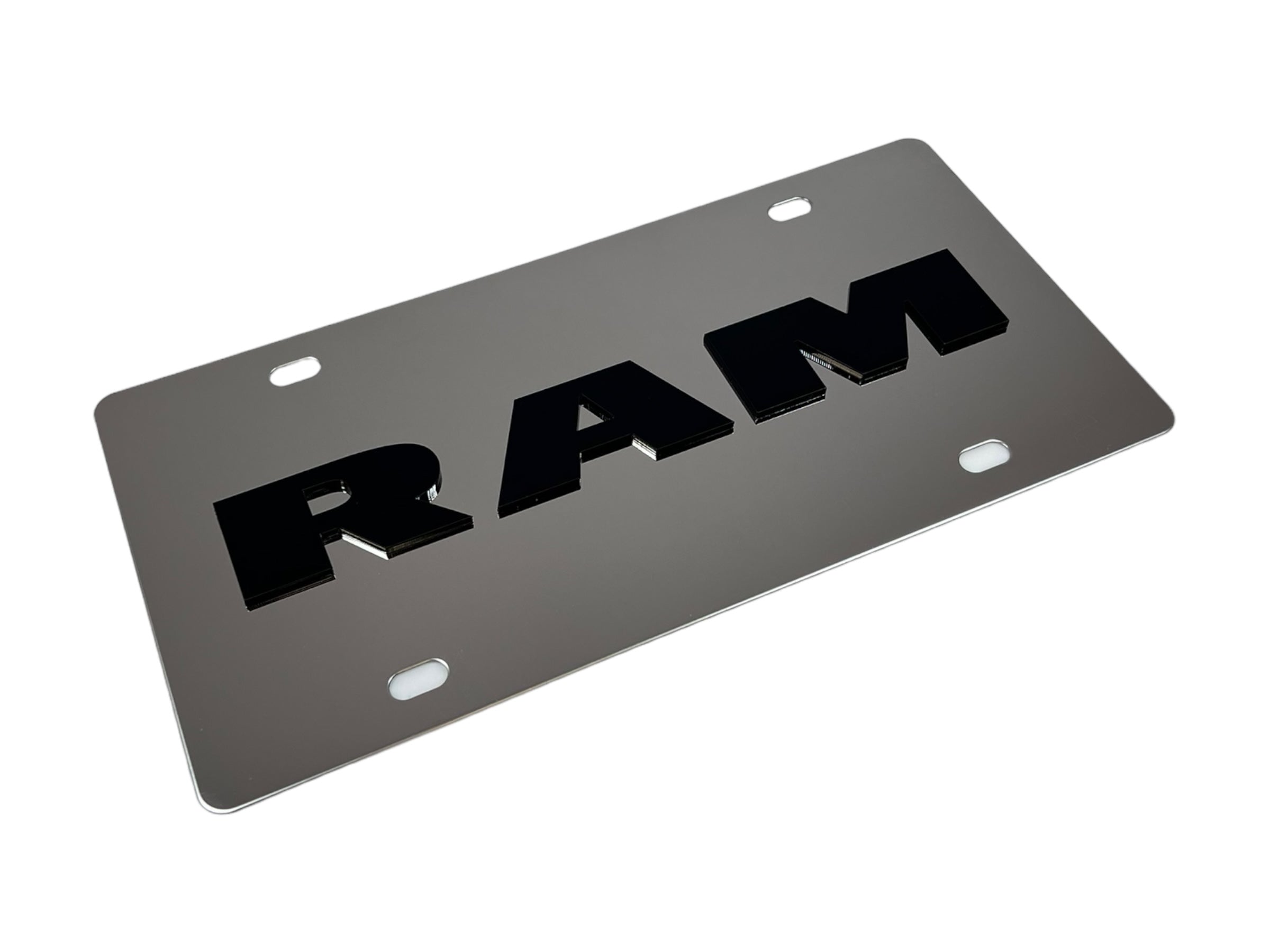 a metal license plate with the word ram on it