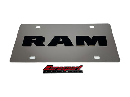 a metal license plate with the word ram on it