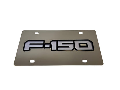 a metal license plate with the word fi50 on it