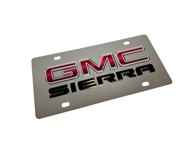 a metal license plate with the gmc sierra logo