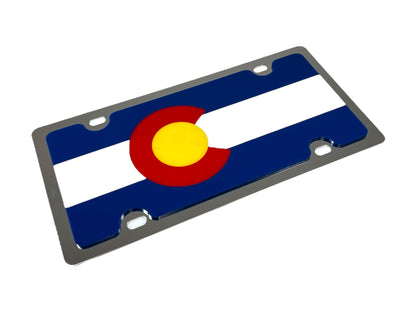 a metal license plate with the flag of colorado