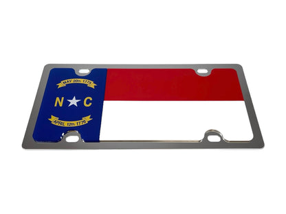 a metal license plate with the flag of north carolina