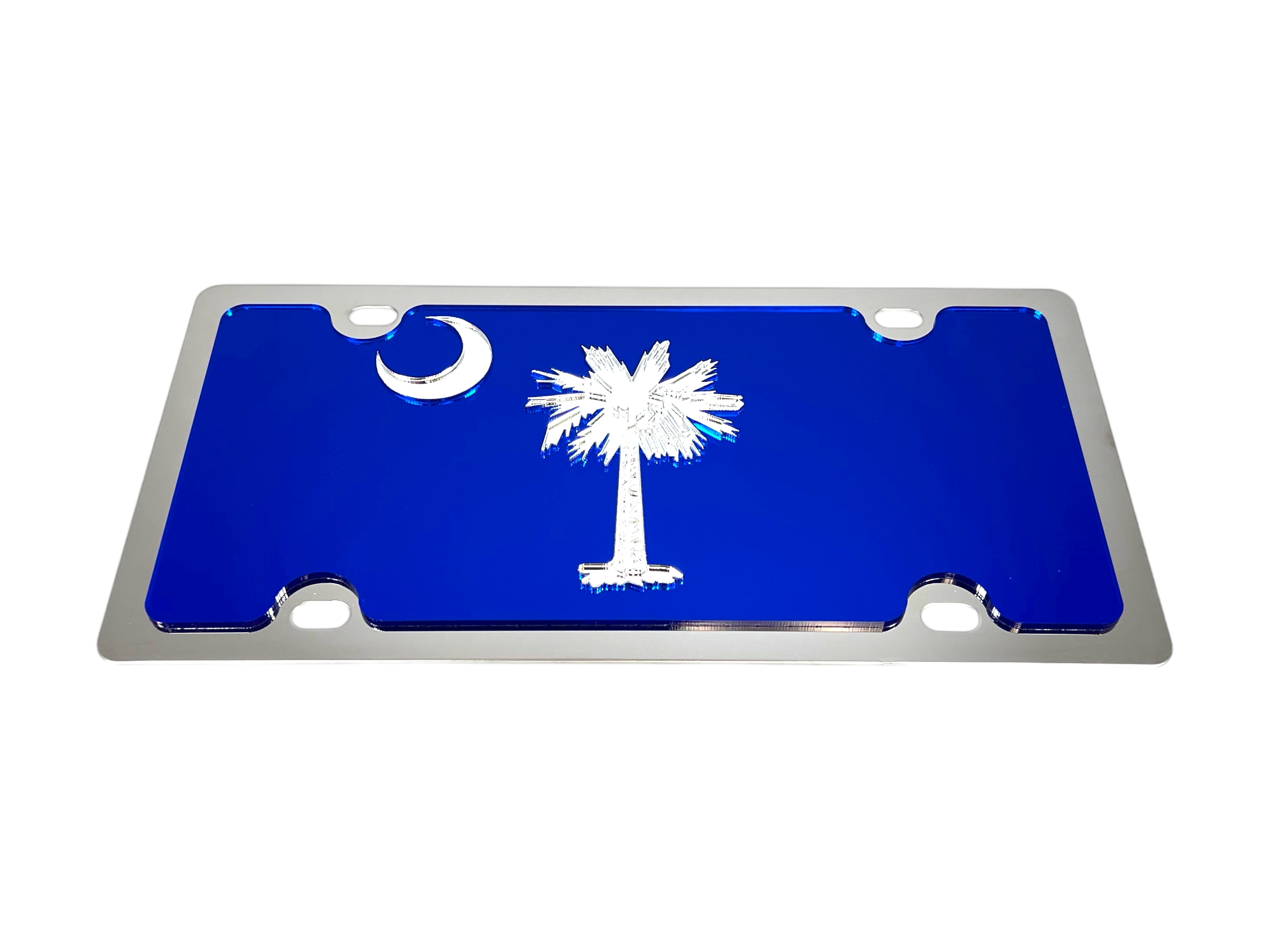 a blue license plate with a palm tree and the moon