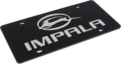 a black license plate with the word impala on it