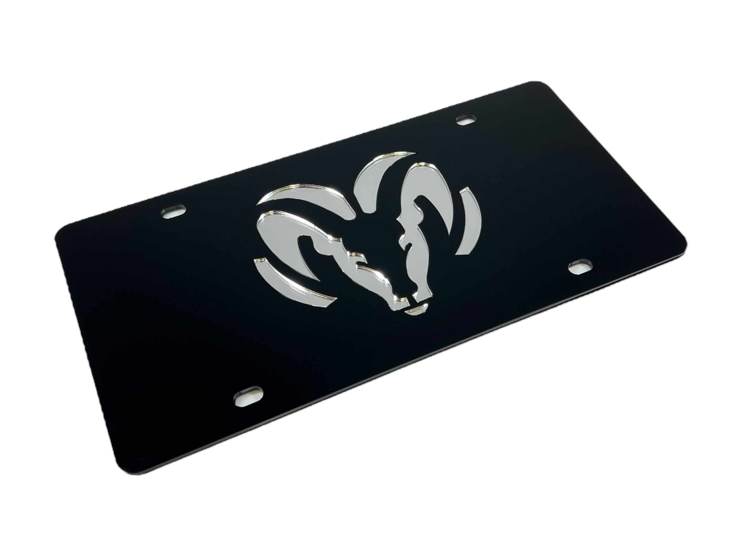 a metal license plate with a ram on it