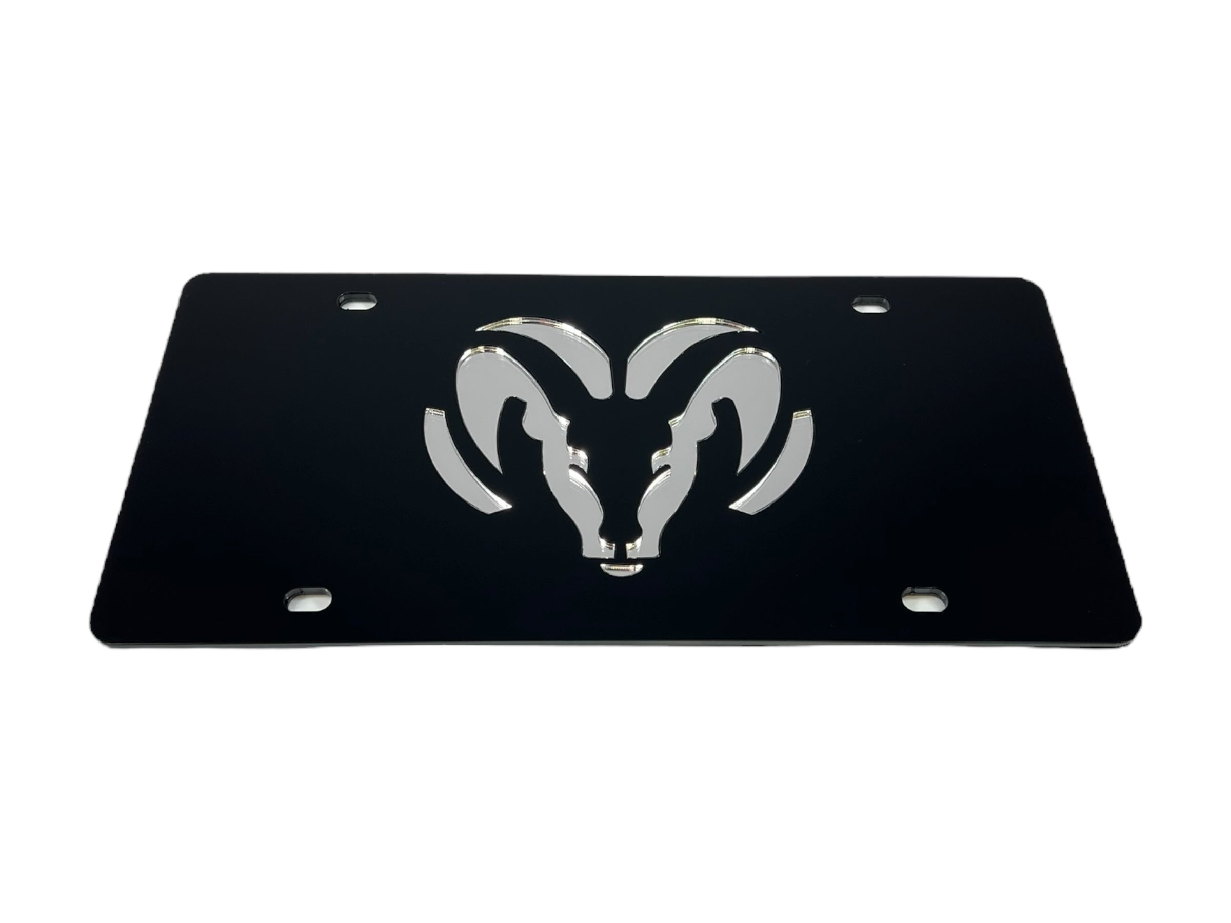 a metal license plate with a ram on it