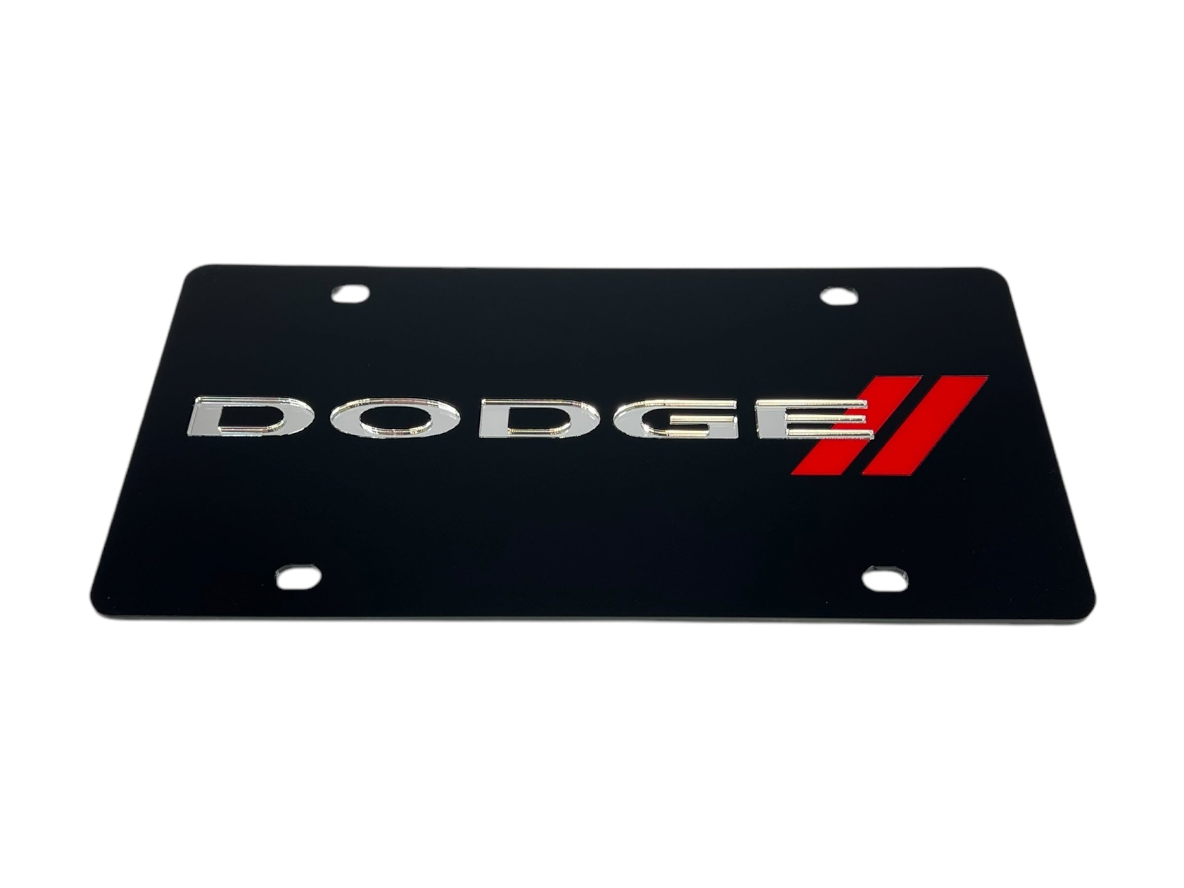 the dodge logo on a black license plate