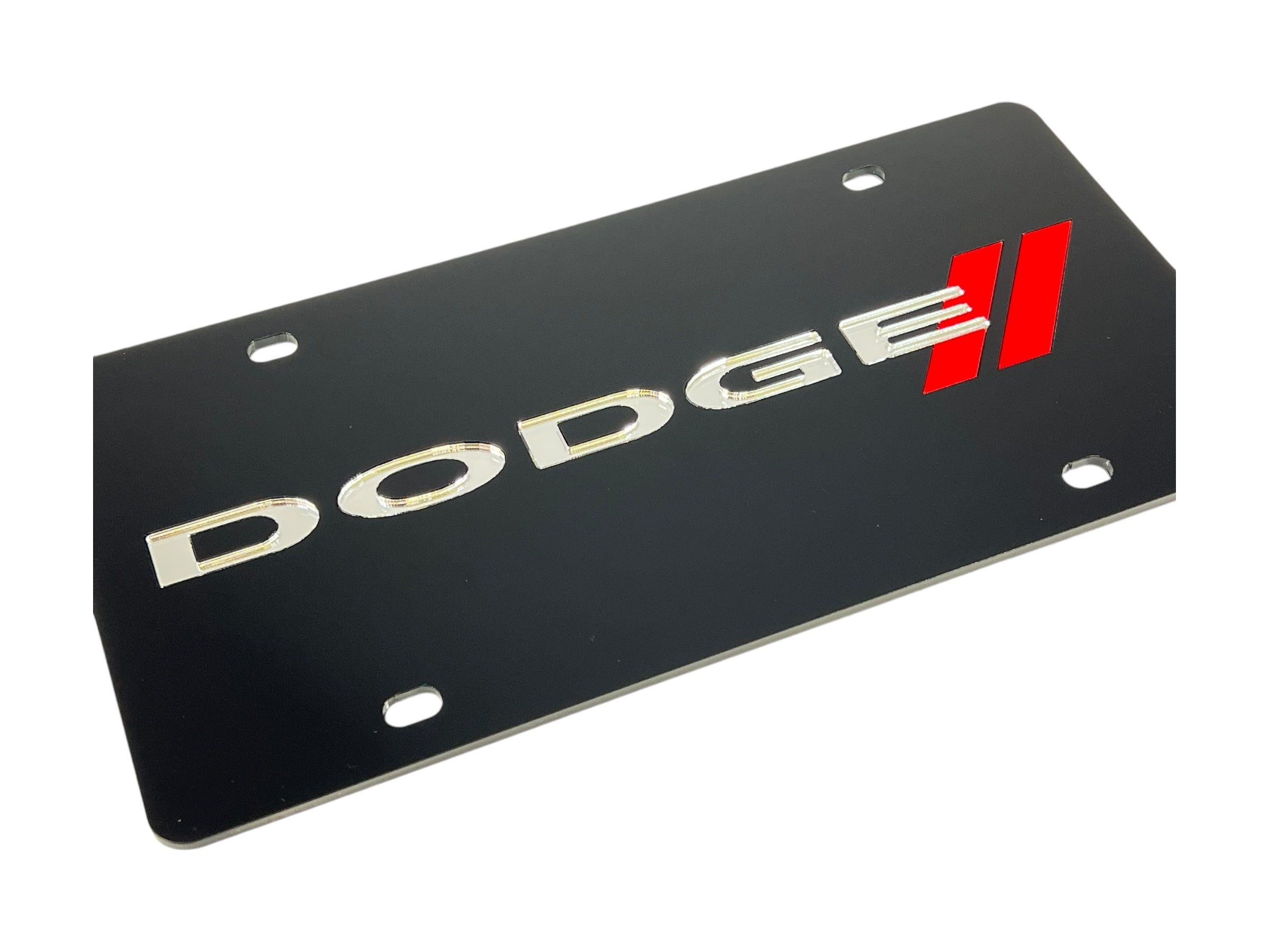 a dodge emblem on a black license plate