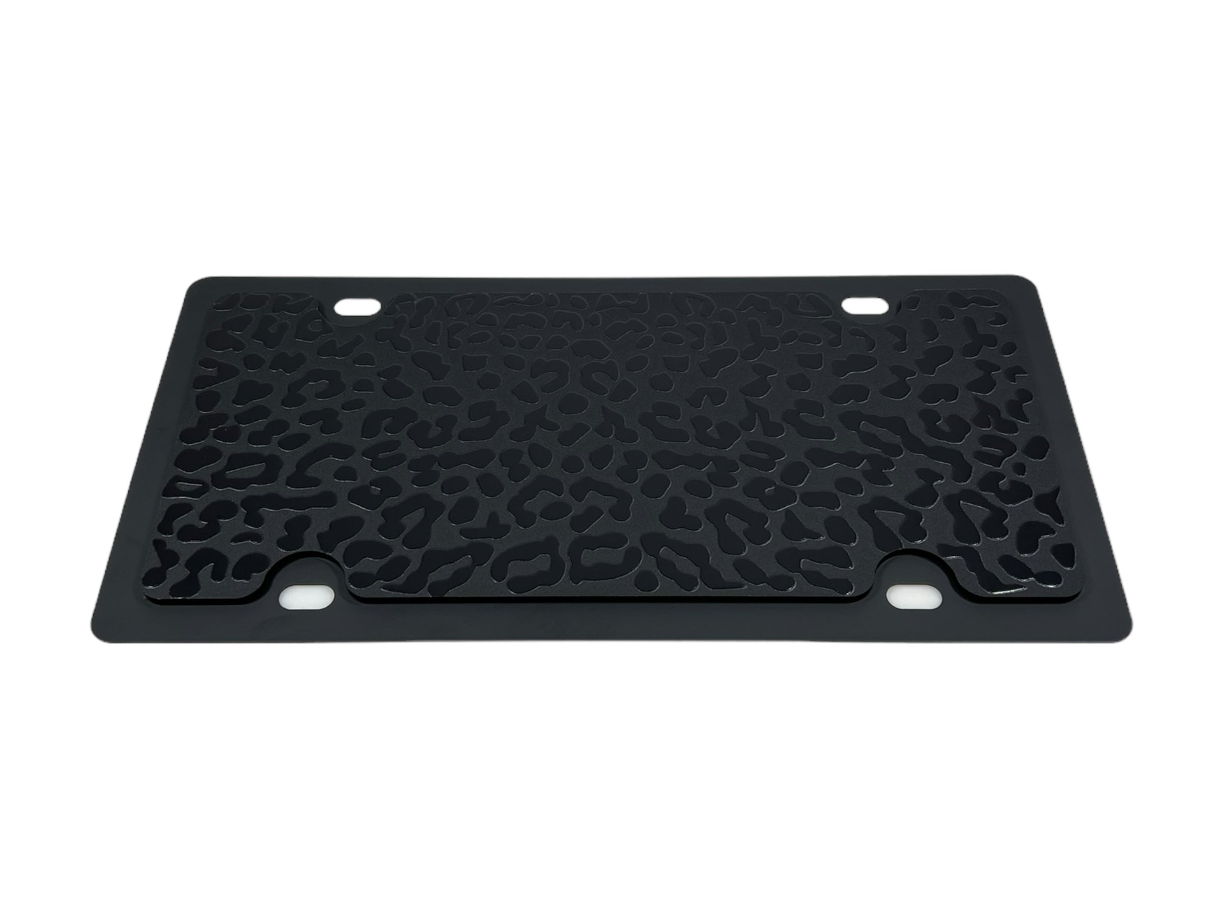 a black tray with a leopard print on it