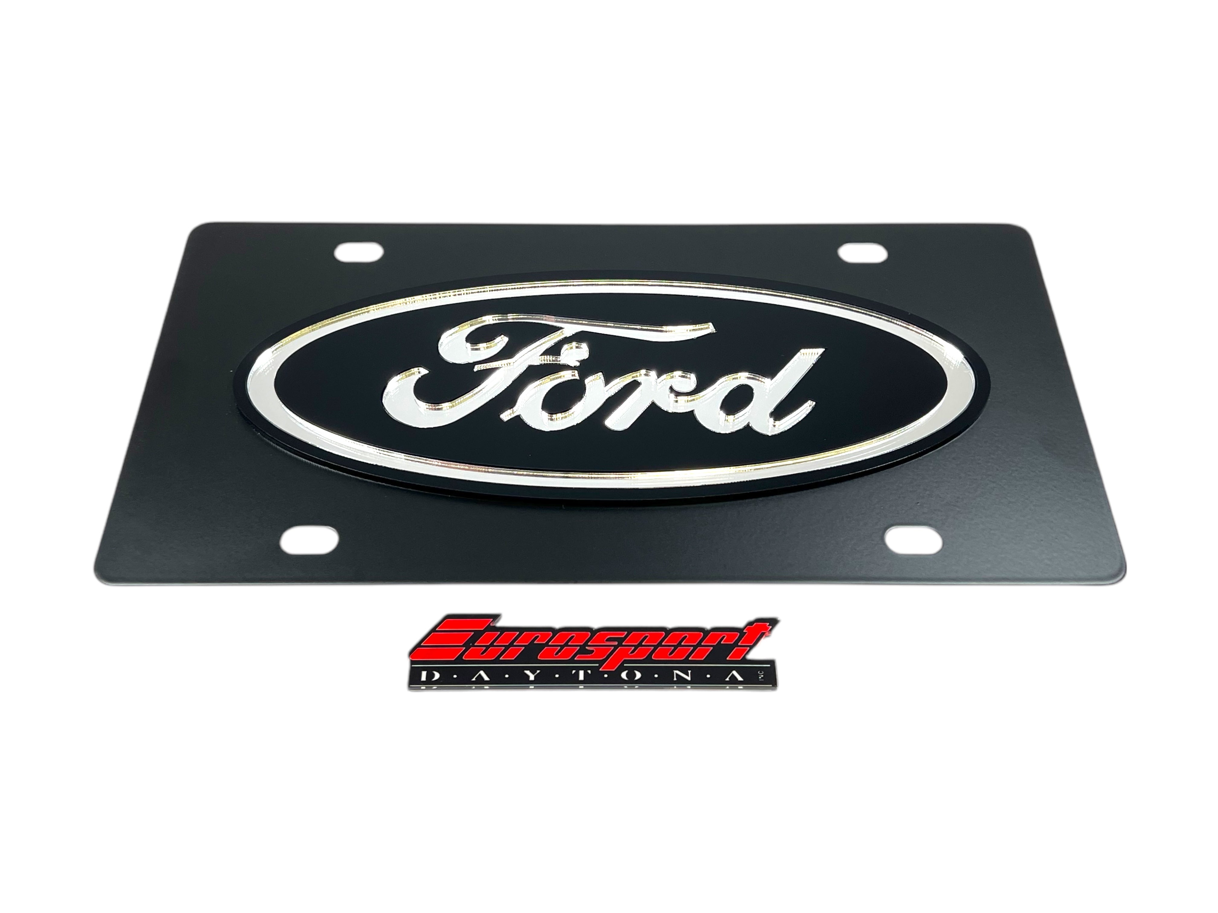 a ford emblem on a black metal plate