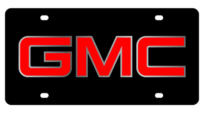 the gmc logo on a black background