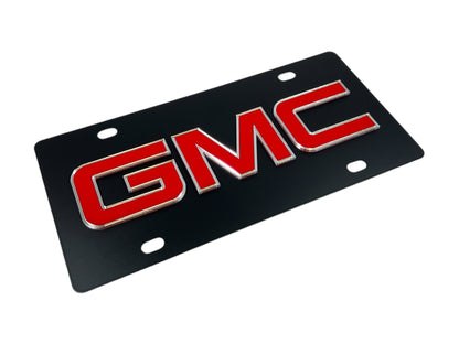 the gmc logo on a black background