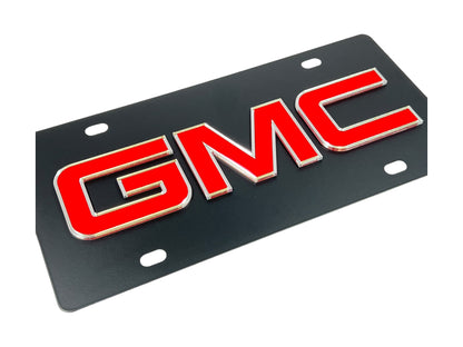 the gmc logo on a black background