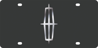a tall metal object on a black background