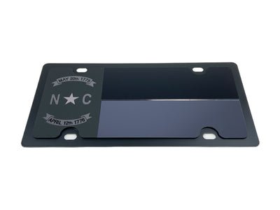 a black license plate with a star on it