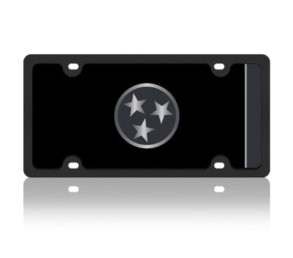 a black license plate with silver stars on it