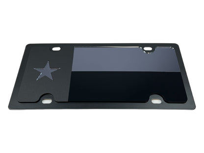 a black license plate with a star on it