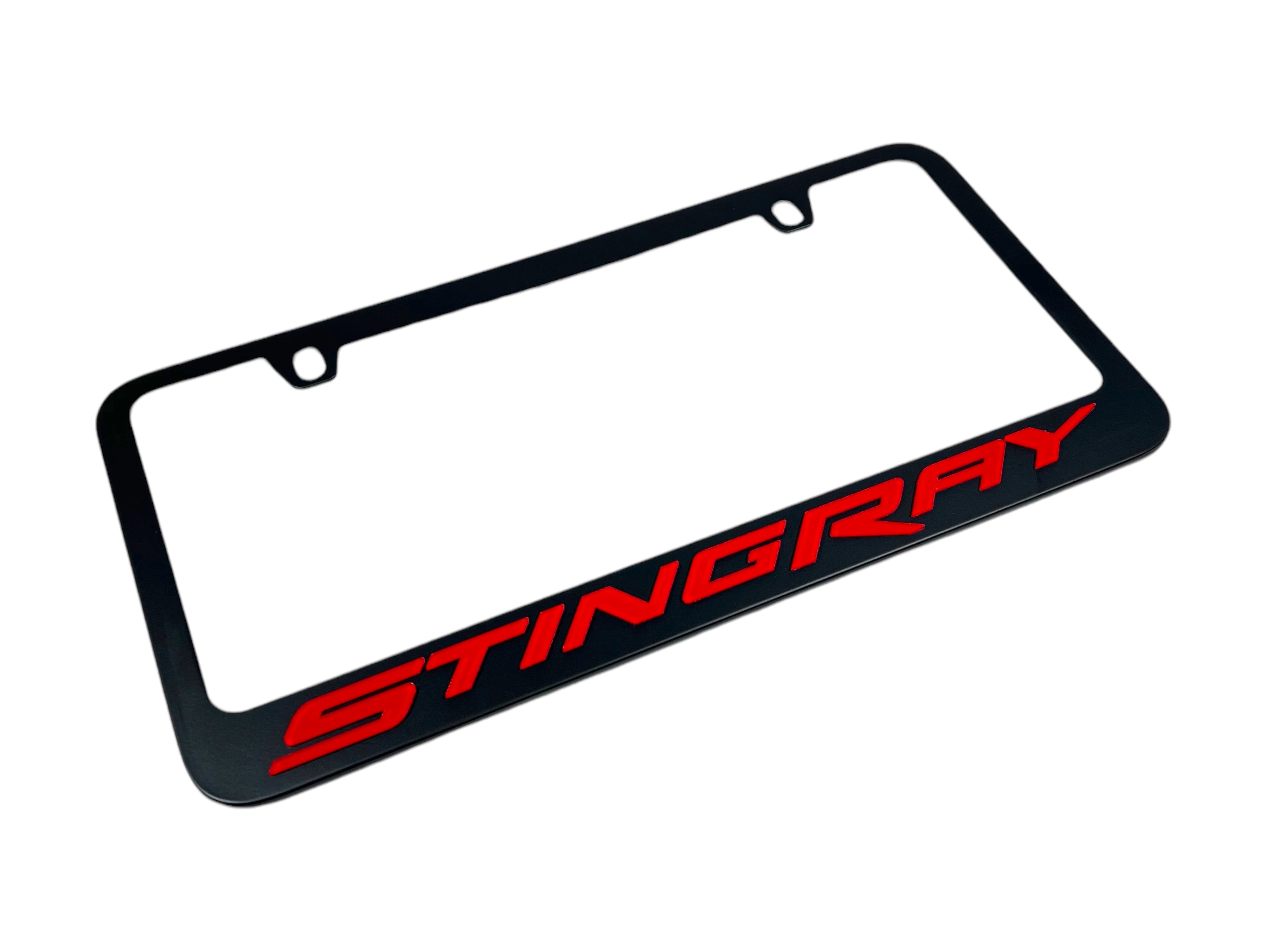 a black license plate with the word stingray on it