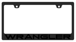 a black license plate frame with the word wrangler on it