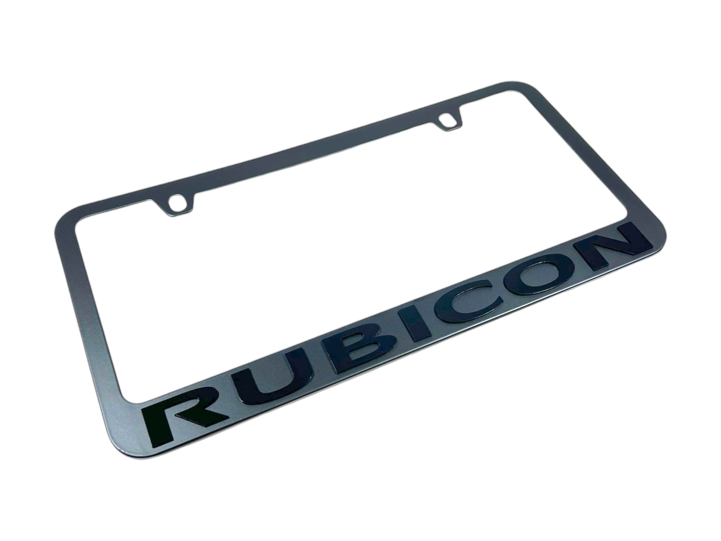 a chrome license plate frame with the word rubicon on it