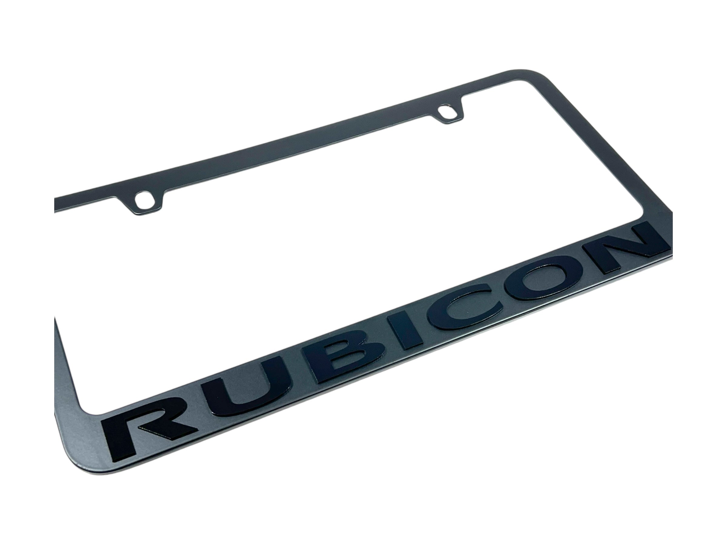 a chrome license plate frame with the word rubicon on it