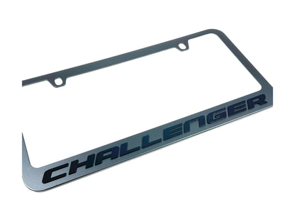 a chrome license plate frame with the word challenger on it