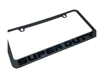 a black license plate frame with the word super duty