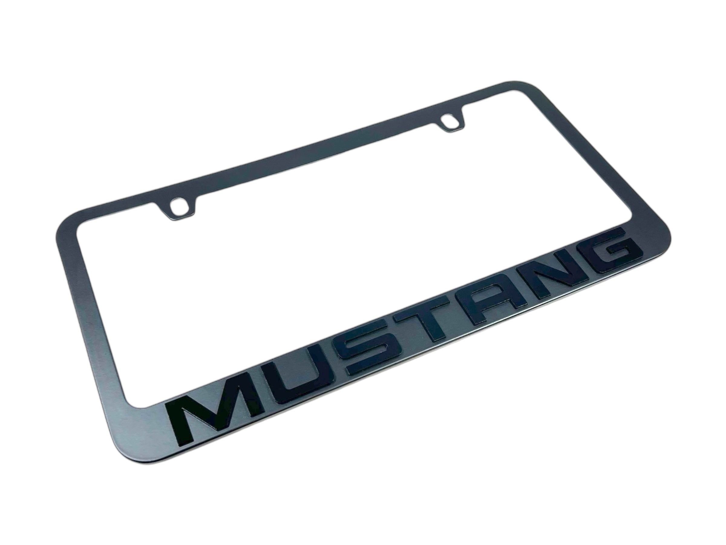 a metal license plate with the word mustang on it