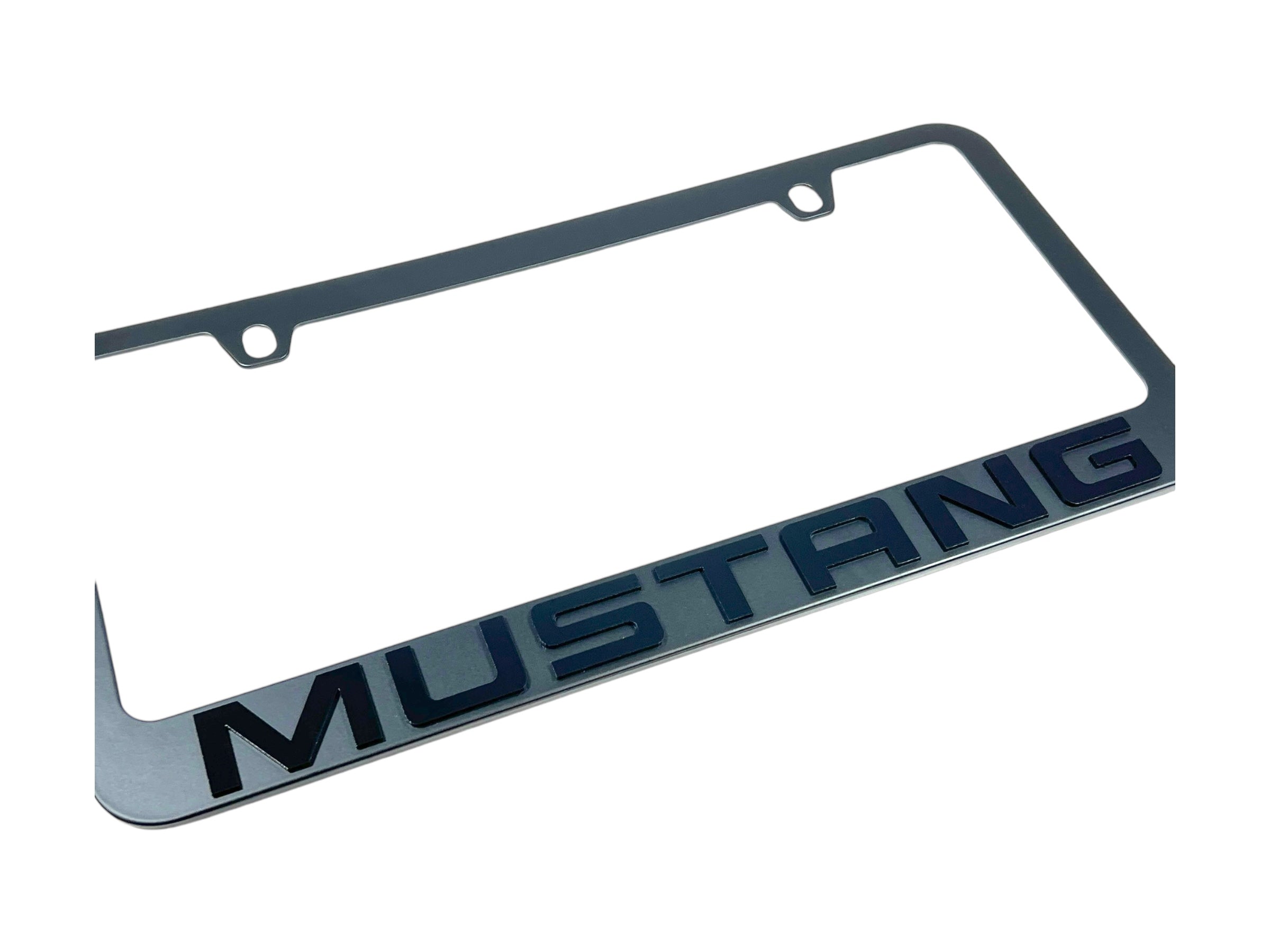 a metal license plate with the word mustang on it