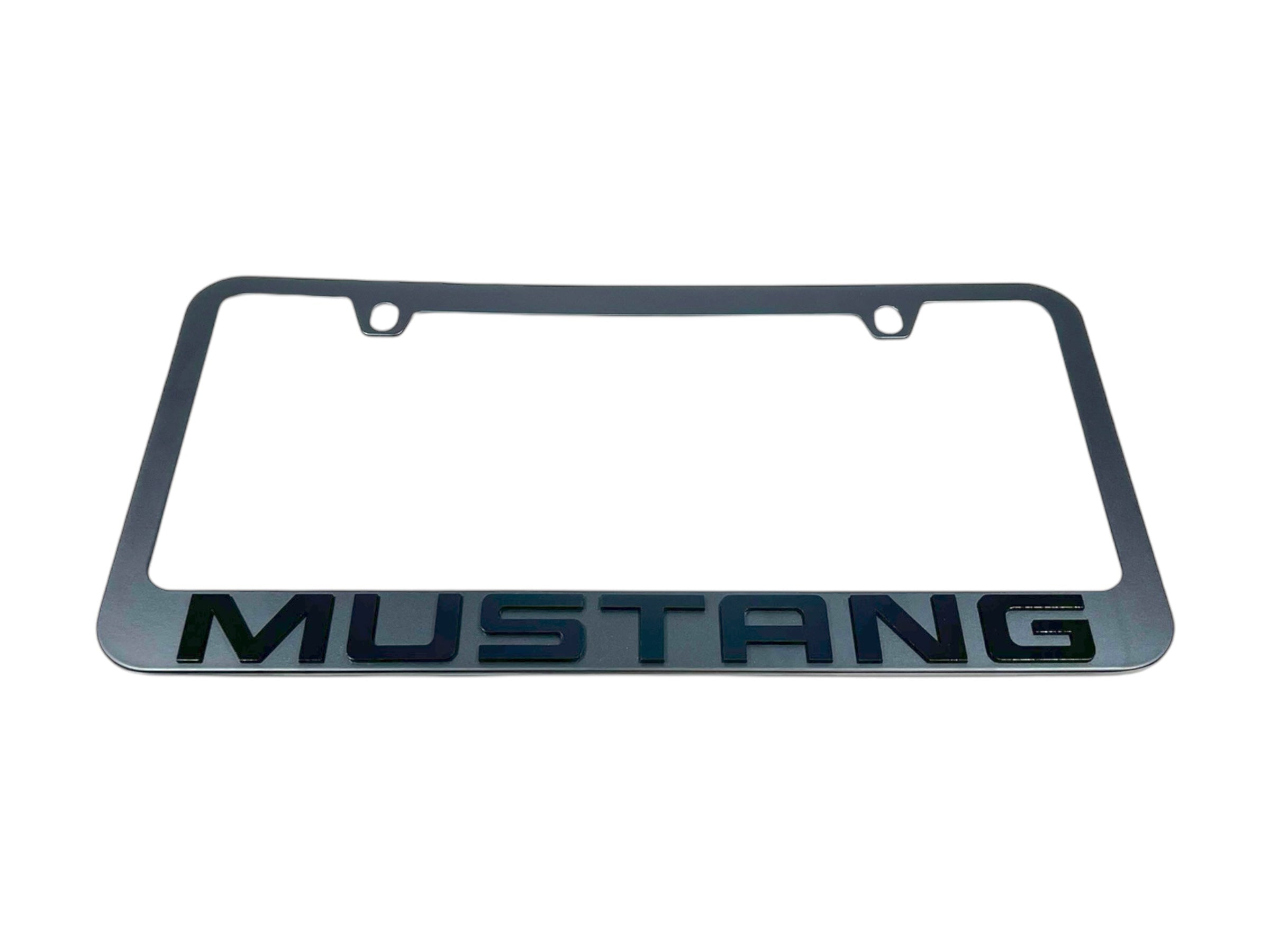 a metal license plate with the word mustang on it