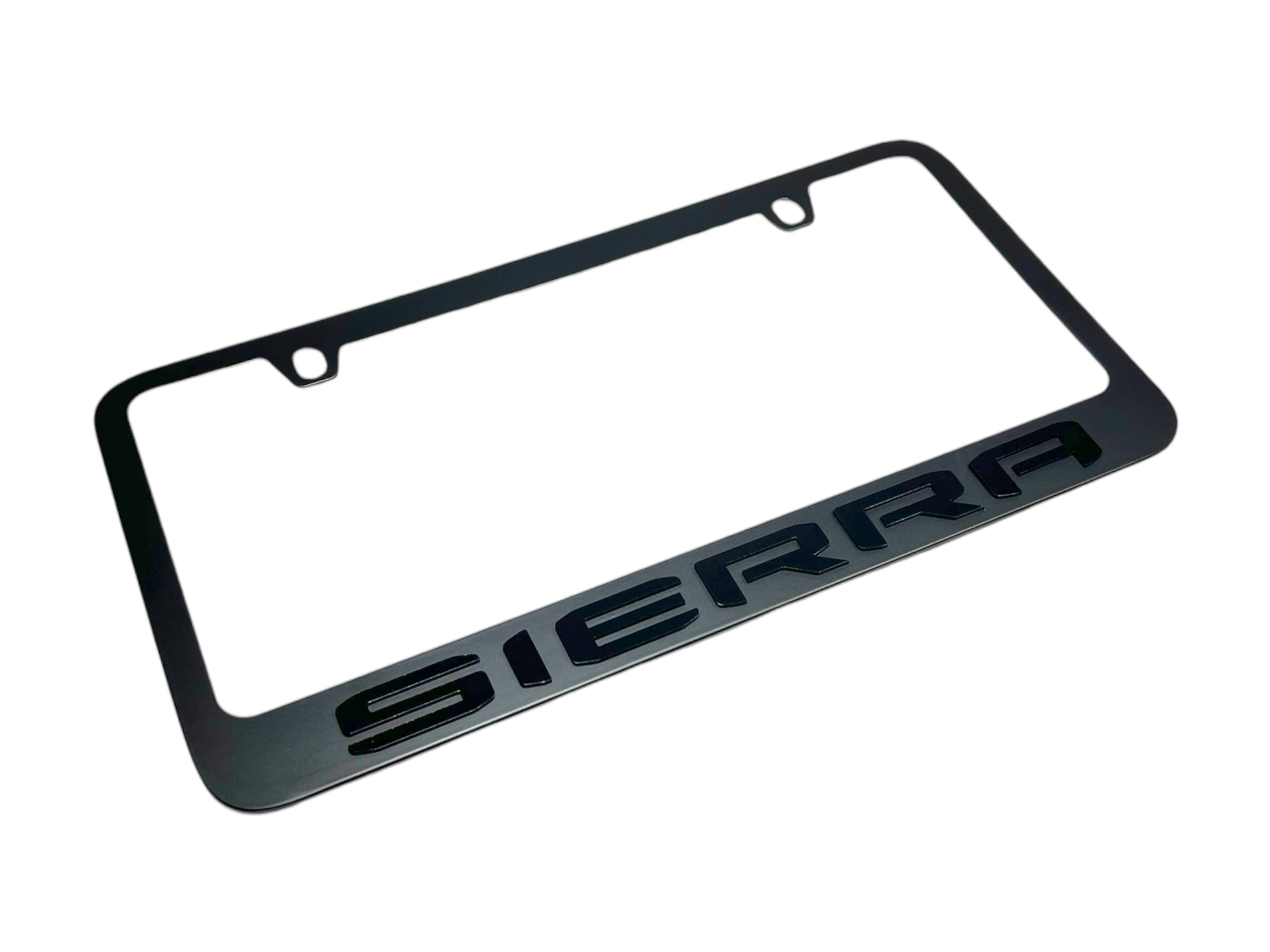 a chrome license plate frame with the word porsche on it