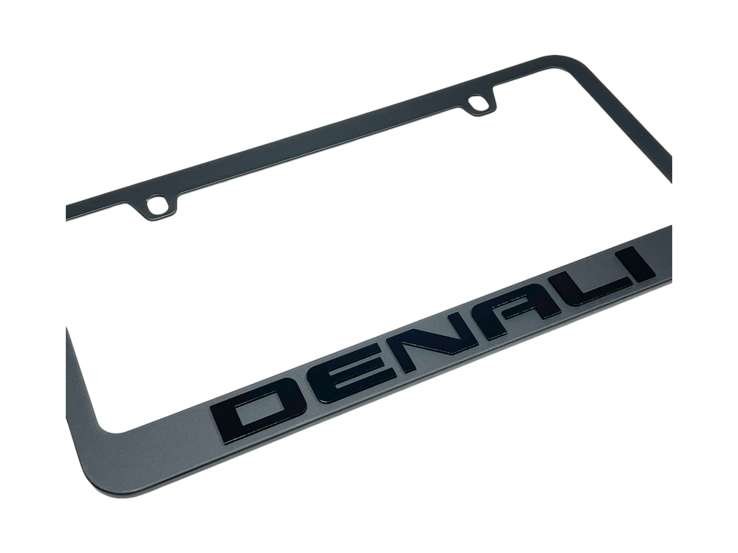 a license plate frame with the word denali on it