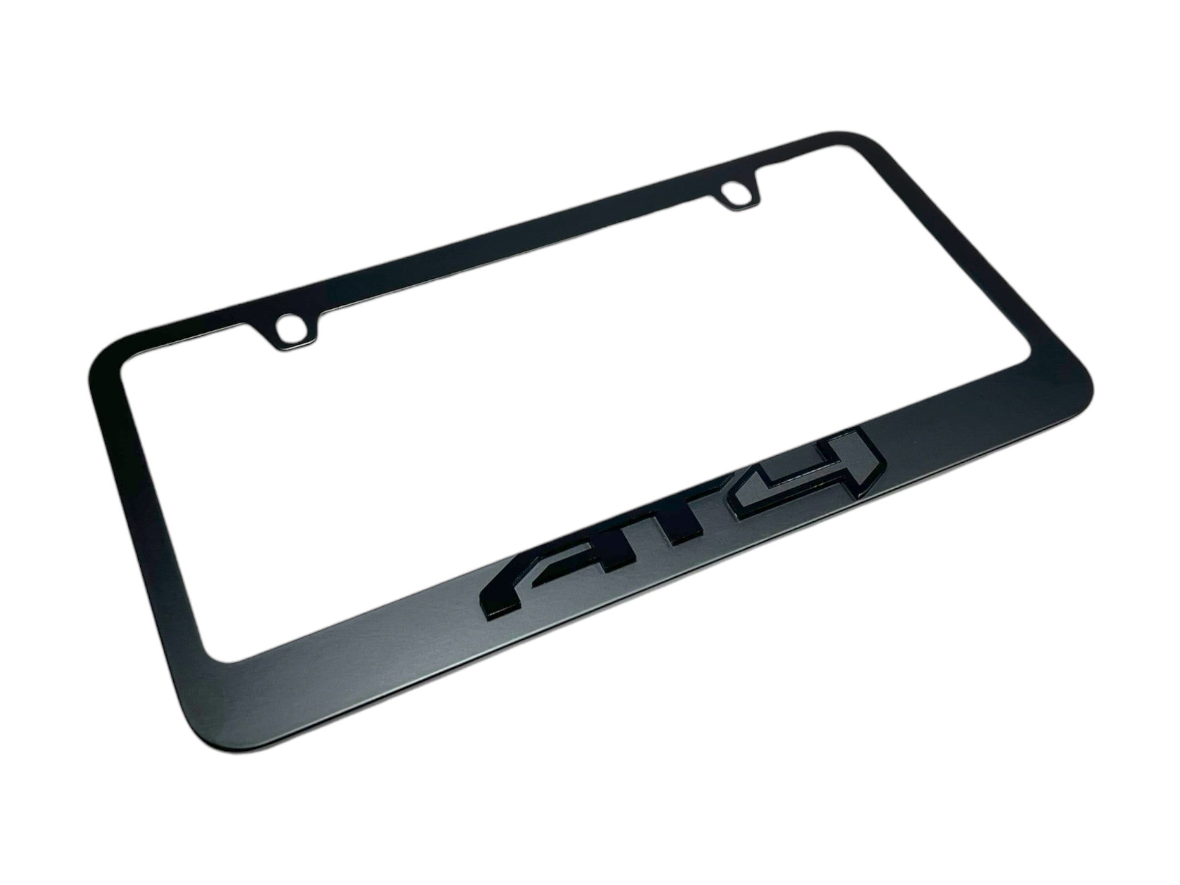 a black license plate frame with the word gtp on it