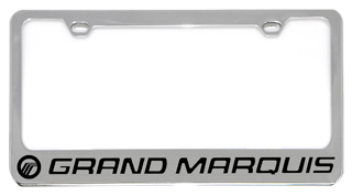 a metal license plate frame with the word grand marque