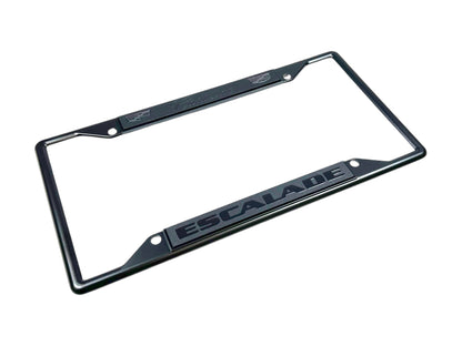 a black license plate frame with the word escape on it