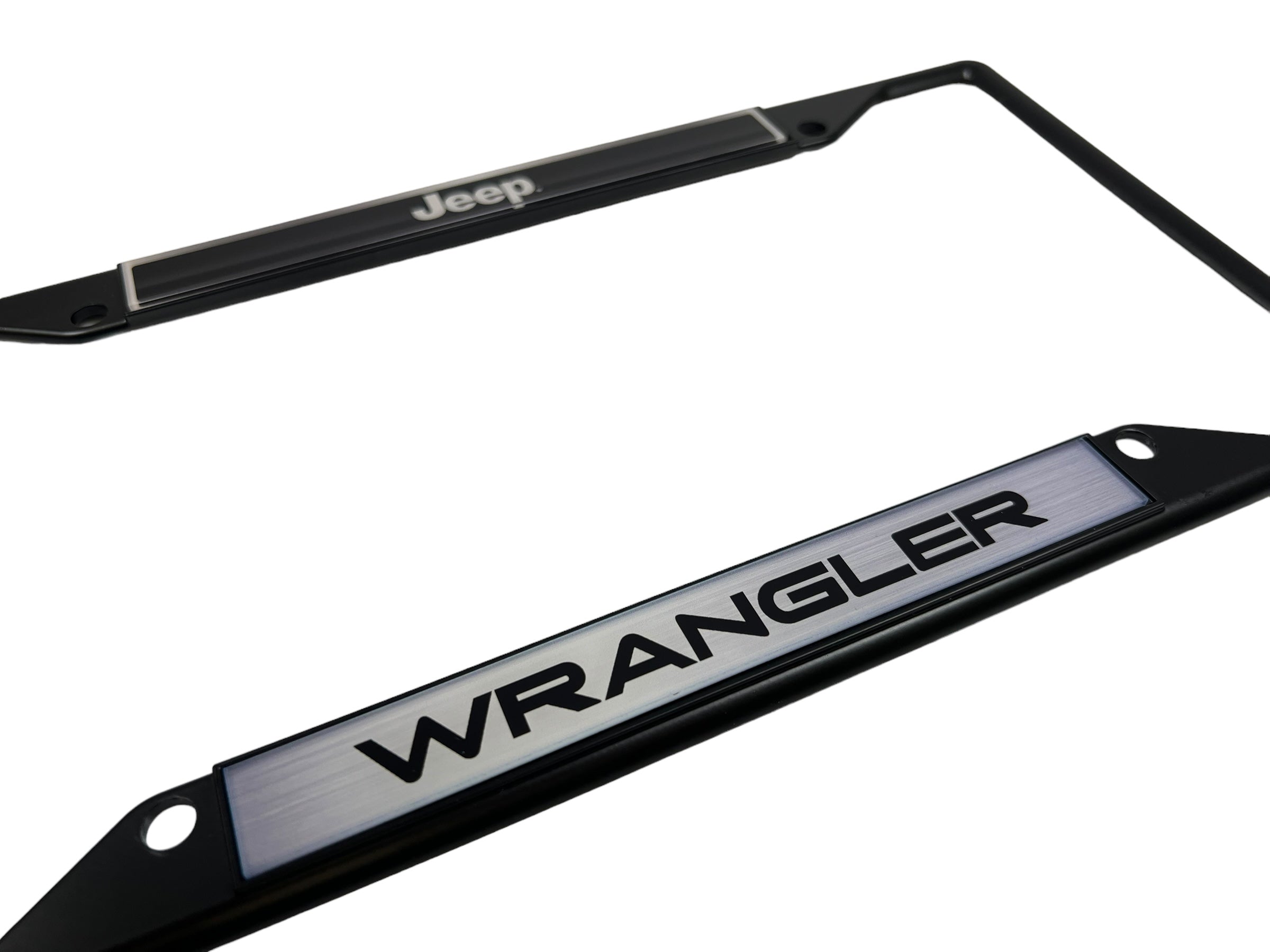 the wrangler license plate frame has the word wrangler on it