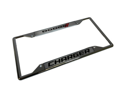 a chrome license plate frame with the word dodge on it