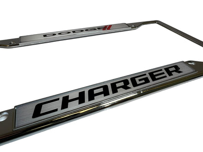 a chrome license plate with the word charger on it