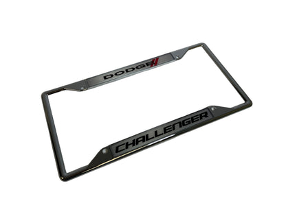 a black license plate frame with the word dodge on it