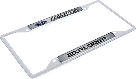 a pair of chrome license plates with the word explorer on them