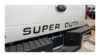 a white truck with a super duty logo on it