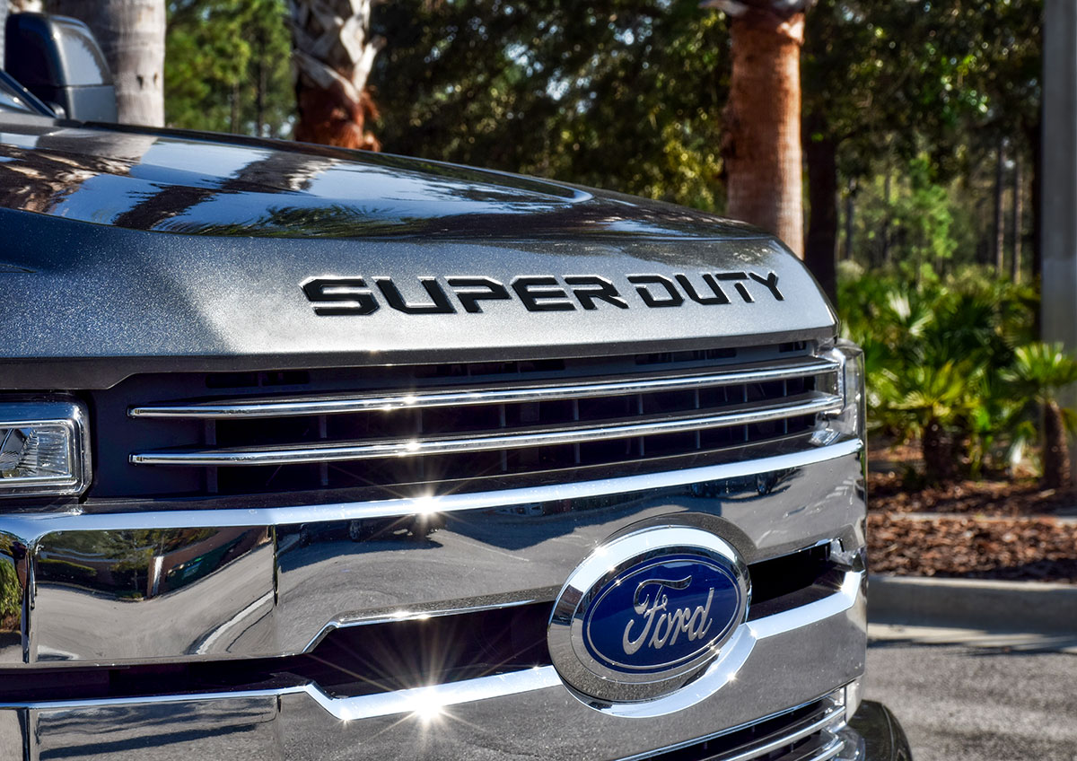 a close up of the front grille of a super duty truck