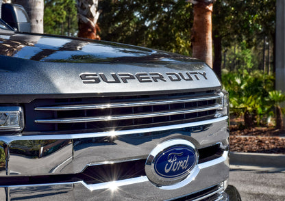 a close up of the front grille of a super duty truck