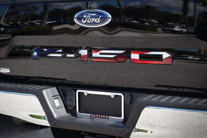 a close up of the emblem on the back of a vehicle