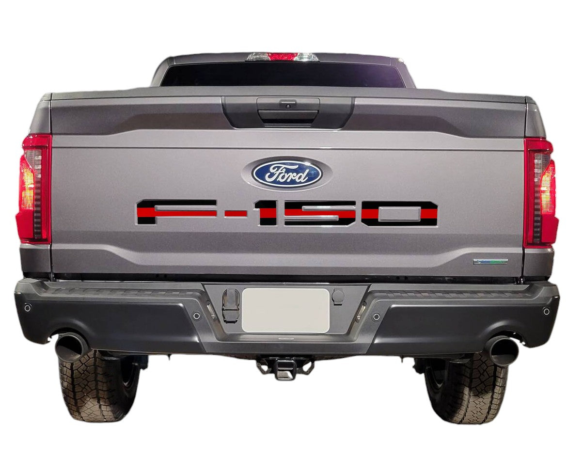 the back end of a gray ford truck