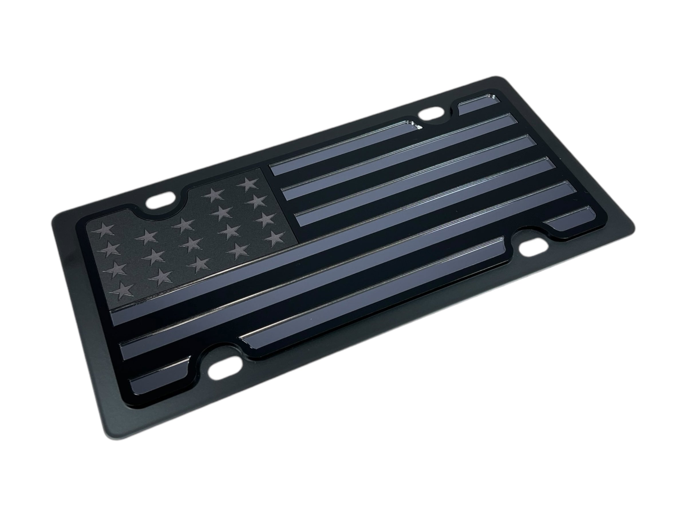 a black american flag license plate on a white background